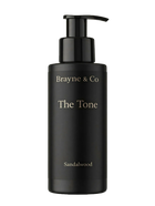 Brayne & Co The Tone — Hydrating Self Tanner for Men in black bottle with pump and sandalwood scent label