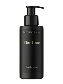 Brayne & Co The Tone — Hydrating Self Tanner for Men in black bottle with pump and sandalwood scent label